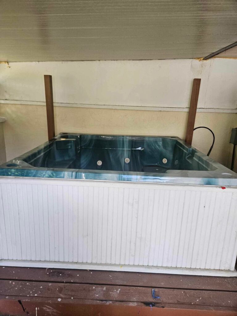Hot tub hauled away from a Parrish, FL backyard