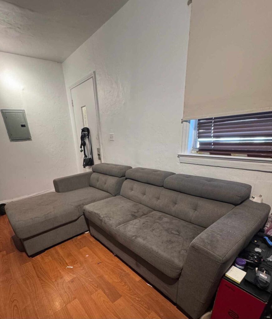 Couch removed during junk removal in Palm Beach, FL