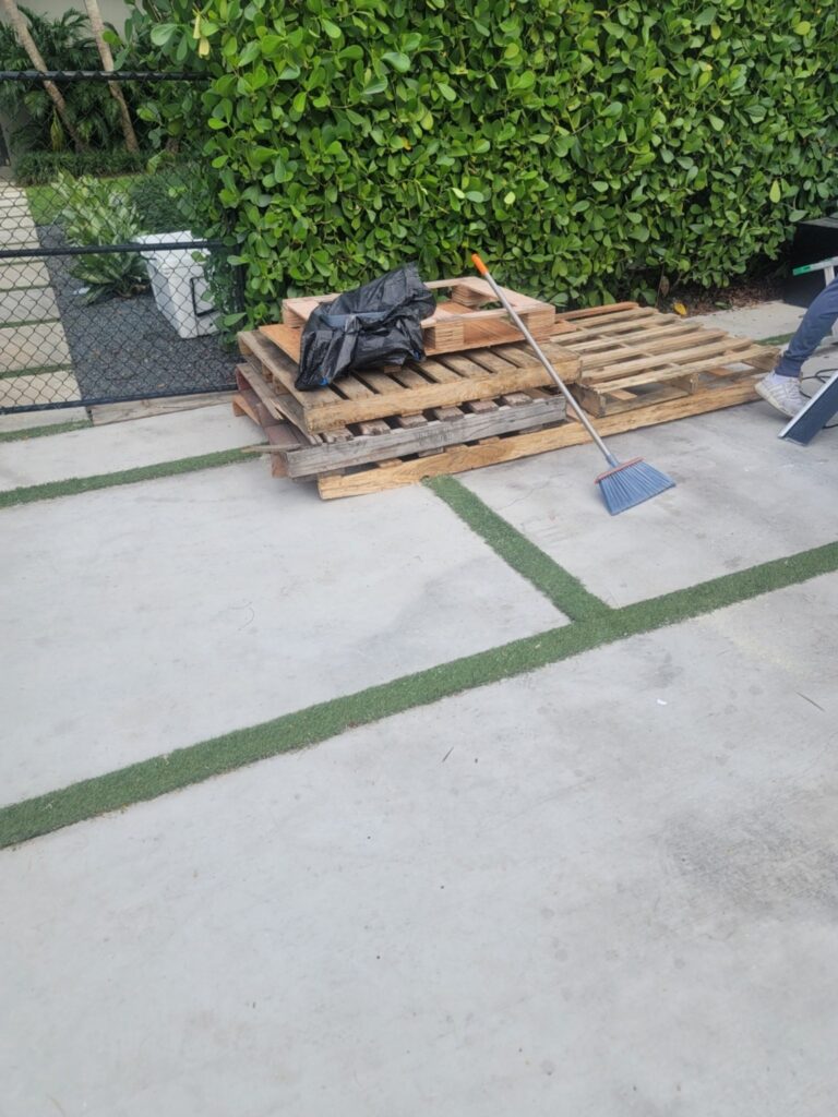 Pallets and debris ready for hauling in Naples, FL