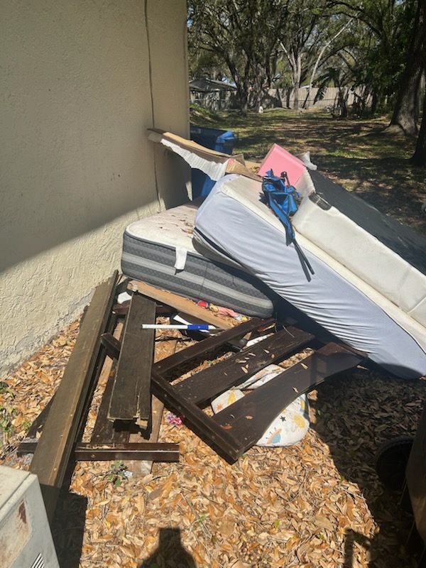 Pile of furniture from eviction clean out in Sarasota, Florida