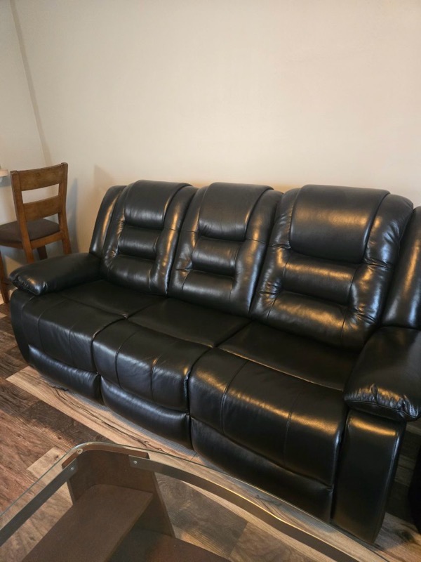Leather sofa removed during junk removal in Naples, FL