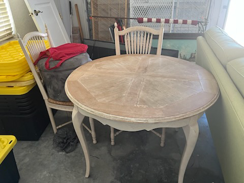 Furniture in a garage ready for junk removal pickup