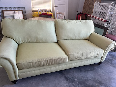 Old couch to be removed by Move It Junk Removal