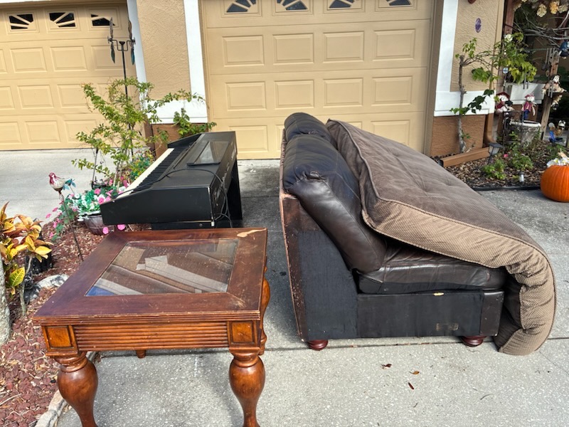 House cleanout crew hauling furniture in Ruskin, FL