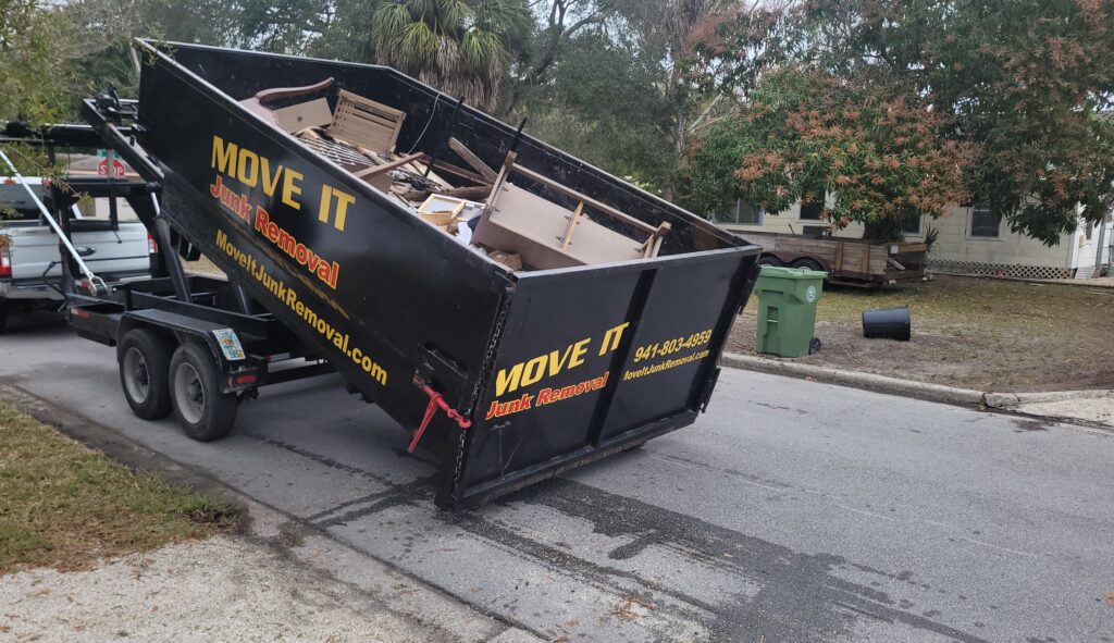 Dumpster Rental Sarasota, FL 2 Move It Junk Removal Dumpster loaded with debris in Sarasota