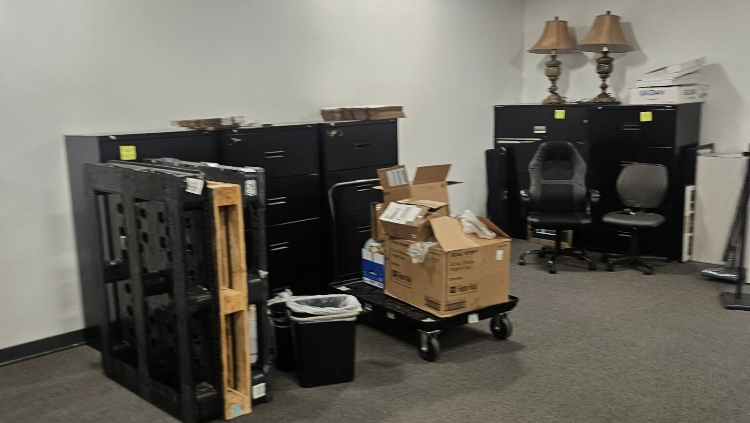 Office Cleanout Services 2 Office cleanout crew clearing furniture from a Florida business